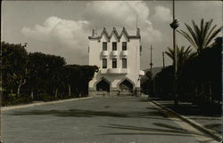 View of Large Building at End of Street Postcard