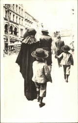 Rear View of Family Walking in Street, Delivery Wagon Children Postcard Postcard