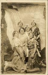 Group of women in front of waterfall Postcard Postcard