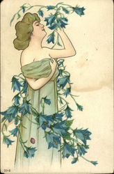 Woman in Long Green Gown Smelling Vine with Blue Flowers Postcard