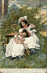 Two Little Girls in White Ruffled Dresses Hold Orange Flowers and Sit on Bench Postcard