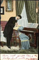 Man in Suit Hugging Woman in Blue Gown Seated at Piano Couples Postcard Postcard