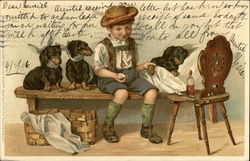 Boy Nursing Three Dogs Postcard