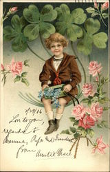 Little Boy Holds Green Box with Forget-me-Nots with Four-Leaf Clovers in Background Postcard