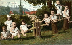 Babies on a SeeSaw Postcard