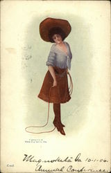 Cowgirl wearing Holster, Fringed Skirt, Large Hat and Holding Lasso Postcard