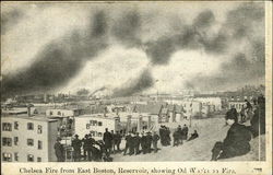 Chelsea Fire from East Boston, Reservoir, Showing Oil Works on Fire Massachusetts Postcard Postcard