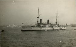 Warship (U.S.S. Olympia?) Towed to Sea Postcard