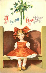 A Happy New Year with Girl sitting under Mistletoe Postcard