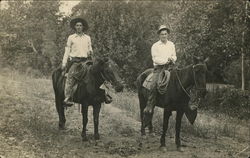 Two Men on Horseback - Cowboys Postcard