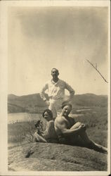 Two Men and Woman Posing on Hill Postcard Postcard