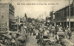 Main Street Looking North on Busy Day Winnsboro, TX Postcard Postcard