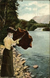 Woman in Brown Skirt and Yellow Blouse Opens Umbrella on the Shoreline Postcard