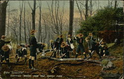 Boy Scouts Cutting Wood for the Camp Fire Postcard