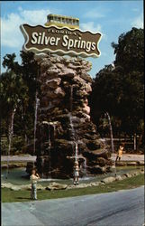 Fountain with Model of Glass Bottom Boat Silver Springs, FL Postcard Postcard