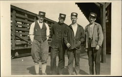 Portrait of Train Conductors at Station Postcard