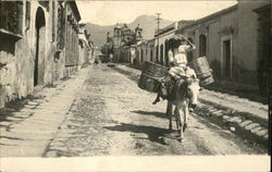 Man Riding Donkey Down Street Oaxaca, Mexico Postcard Postcard