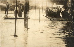 Flooded streets in an early 20th century community RPO Kansas Postcard Postcard