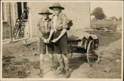 Two Boy Scouts Pulling Wagon Postcard