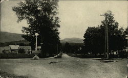 Photo of a intersection of dirt roads in a small town New York Postcard Postcard