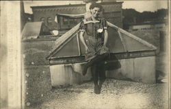 Girl Posing on Roof of Building Postcard