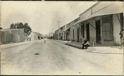 Street view of a small town in Mexico in early 20th century Postcard Postcard