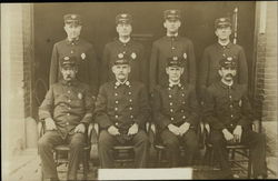 Portrait of Eight Firemen (or Policemen) Postcard