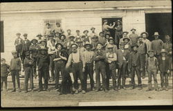 Group photograph of working men early in the 20th century Postcard