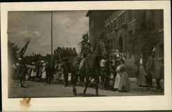 Exotic rider atop a horse in an early 20th century parade Postcard