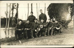 Group photograph of soldiers singing Postcard