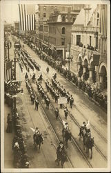 The American Red Cross marches in an early 20th century parade Events Postcard Postcard