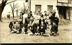 Group photo of the Pelton and Shultis families in the early 20th century Postcard