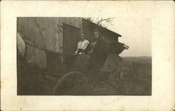 Photograph of women in a horse-drawn carriage, 1913 Postcard