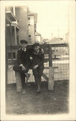 Two Boys Leaning on Fence Jackson, MI Postcard Postcard