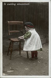 Boy with Handsaw - "A cutting amusement" Children Postcard Postcard Postcard