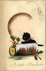 Kitten on a Yule Log Postcard