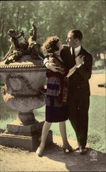 Couple Embracing by Pond and Statue Postcard