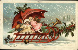 Toys in a Sleigh Being Pulled through Snow by Holly Postcard Postcard Postcard