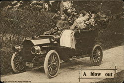 A blow out Four People Drinking in an Antique Car Postcard