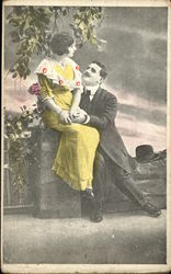 Man wooing Woman in Yellow Dress Postcard