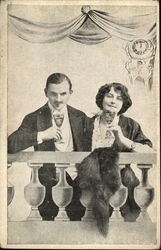 Couple Drinking Wine on a Rail Postcard