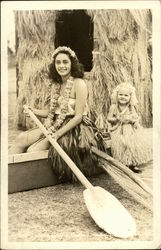 Hula Girls in Grass Skirts in Canoe Hawaii Postcard Postcard Postcard