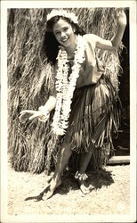 Young Hawaiian Girl Dancing in Hula Skirt and Wearing a Lei Postcard