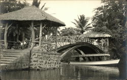 A boat goes under a bridge in Hawaii Postcard Postcard Postcard