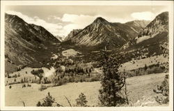 Looking across a valley in a western US mountain range Montana Postcard Postcard Postcard