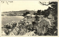 Brick Building on a Californian Cliff Overlooking the Ocean Postcard