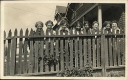 Women Behind a Picket Fence Postcard