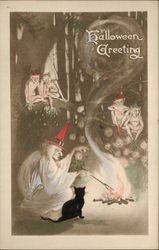 Witch tends to fire while goblins in trees observe. Postcard