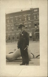 Sheriff with Badge, Giant Shoe Statue, Bicycles Postcard