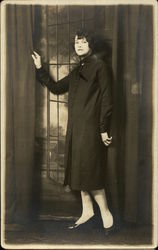 Woman in Doorway Postcard